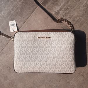 Micheal Kors jet set monogram crossbody